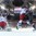 PRAGUE, CZECH REPUBLIC - MAY 16: USA's Dylan Larkin #21 and Russia's Vadim Shipachyov #87 collide next to Sergei Bobrovski #72 during semifinal round action at the 2015 IIHF Ice Hockey World Championship. (Photo by Richard Wolowicz/HHOF-IIHF Images)

